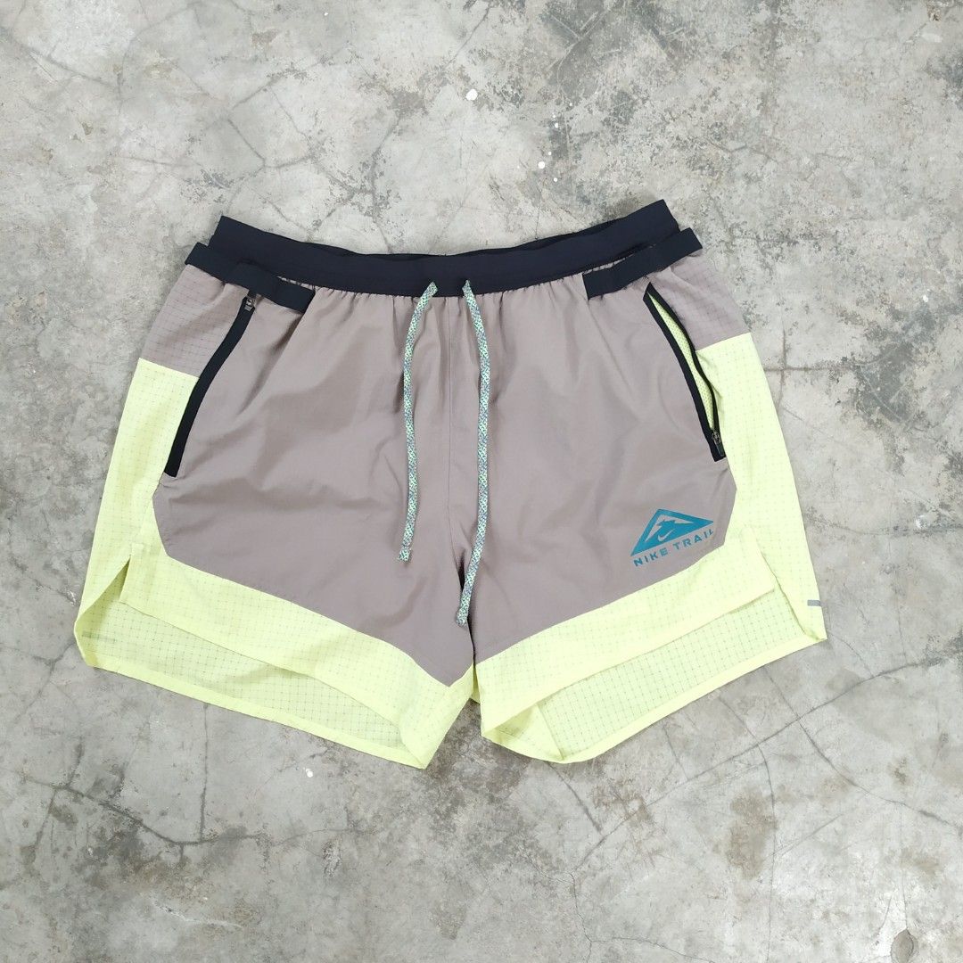 Nike trail online shorts yellow