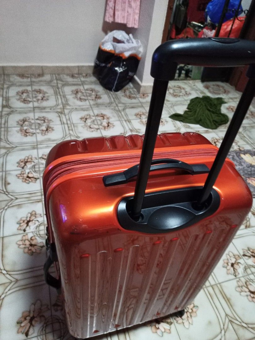 Samsonite orange 2025 luggage