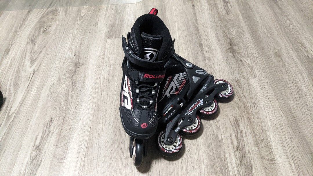 Rollerblade brand adjustable size inline skates, Sports Equipment
