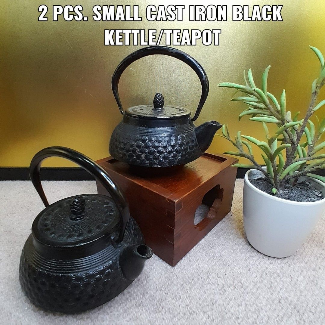 2 PCS. SMALL CAST IRON BLACK KETTLE/TEAPOT (Category: Coffee & Tea Tableware) located in Bulacan. Submitted by sakurajade (Listing ID 1223720067, Image 1). Description: 2 PCS. SMALL CAST IRON BLACK KETTLE/TEAPOT 👉 Price: P1,400 ONLY (TAKE ALL) 👉 Shopee Price: P2,658 (3 pcs.) ✅️ Good condition, as good as new, decorative, multi-purpose, display items, authentic/traditional Japanese ✅️ Material: Cast Iron ✅️ Issue: No box, as-is.