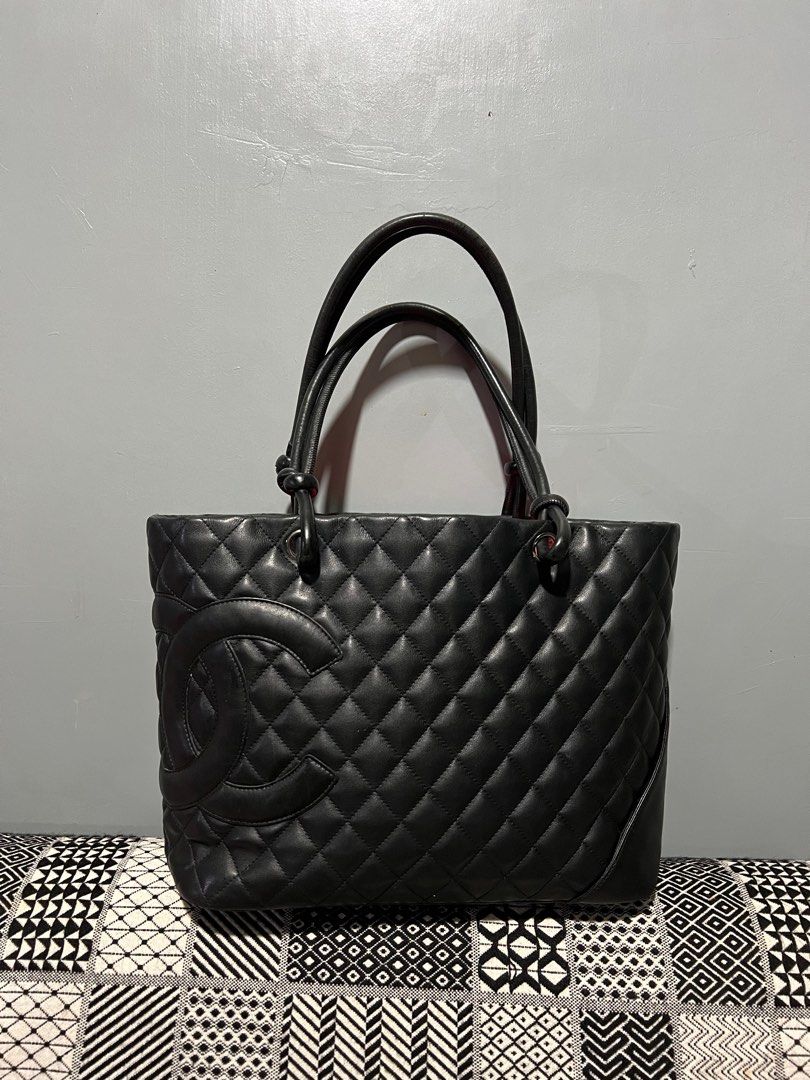 Authentic Chanel Cambon Quilted Lambskin (Category: Luxury Bags & Wallets) located in Binalonan. Submitted by sheenaluxarchive (Listing ID 1223722217, Image 1). Description: Authentic Rank AB-B Need cleaning Holo intact Bawal po sa maarte May flaw sa handle pero sa ibabaw lang ung crack Cheapest Chanel Cambon here sa carou.