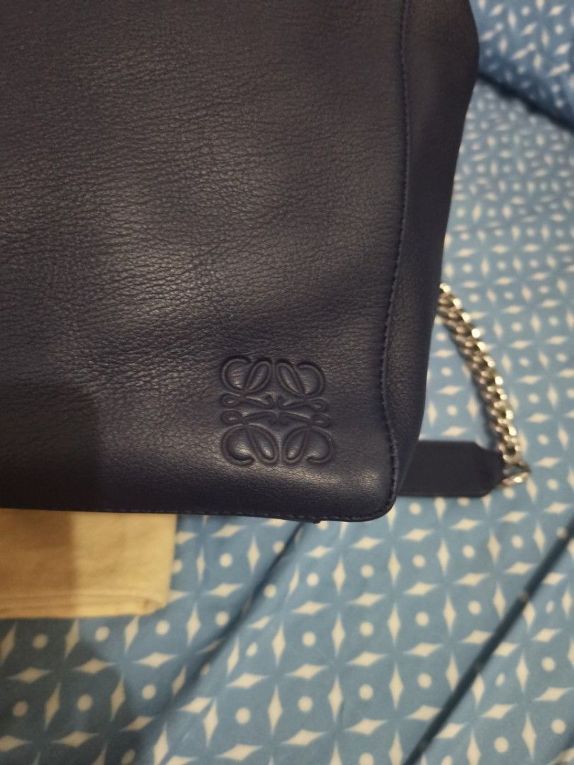 Authentic Loewe V Bucket Bag (Category: Luxury Bags & Wallets) located in Dinalupihan. Submitted by hydzsalva (Listing ID 1223682504, Image 3). Description: Authentic and rare Loewe V Bucket bag in navy blue color With dustbag inclusion.