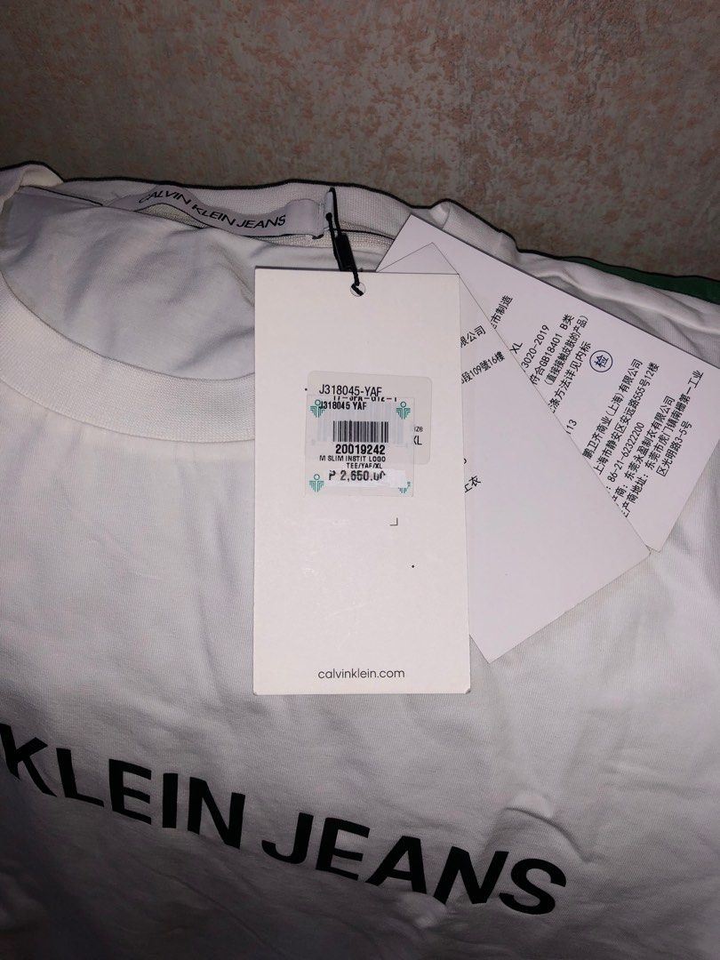 Calvin Klein 2 Tee’s Bundle (Category: Tshirts & Polo Shirts ) located in Malabon City. Submitted by jayzdeclutters (Listing ID 1223682423, Image 3). Description: 100% AUTHENTIC & SAVE ₱1,100 NEGOTIABLE Store Price for Both Items Total: ₱6,600 ₱2,650 + ₱3,950 Respectively CAN SEND MORE PICTURES UPON REQUEST Size: Large Fit: Slim Fit Material is Stretchable Reason for Sale: Doesn’t Fit Me Condition: Brand New, Never Used Bought from Calvin Klein M