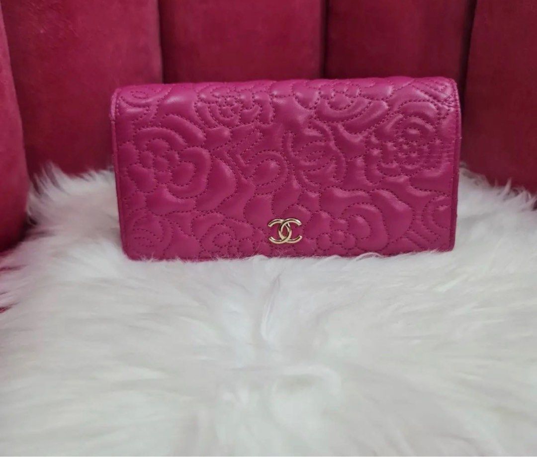 Chanel camellia long wallet (Category: Luxury Bags & Wallets) located in Manila. Submitted by dendc (Listing ID 1223697268, Image 1). Description: Chanel camellia long wallet in fuschia 9/10.