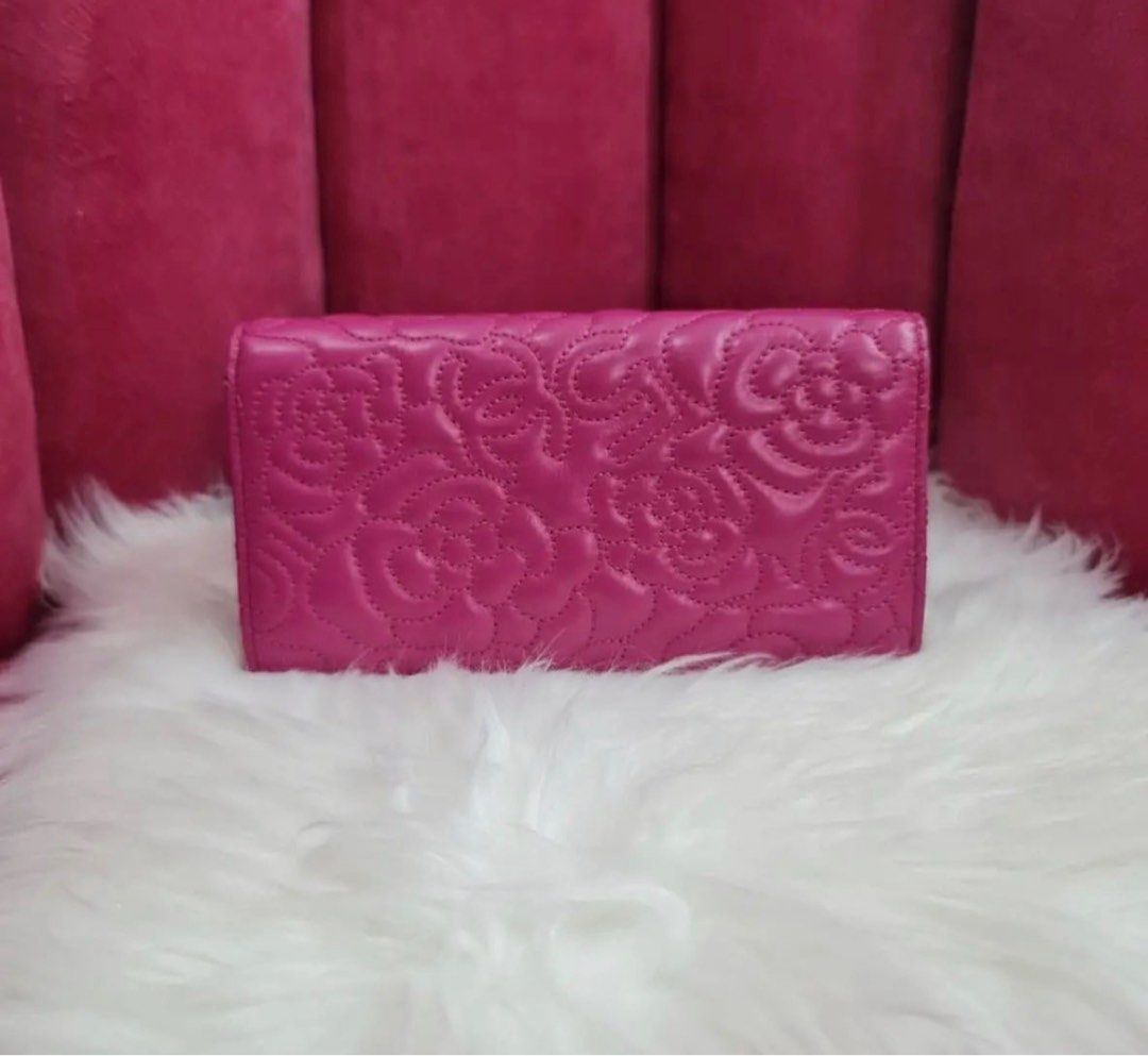Chanel camellia long wallet (Category: Luxury Bags & Wallets) located in Manila. Submitted by dendc (Listing ID 1223697268, Image 3). Description: Chanel camellia long wallet in fuschia 9/10.