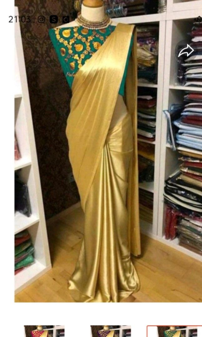 Gold saree with green sleeved blouse Readymade with pleats
