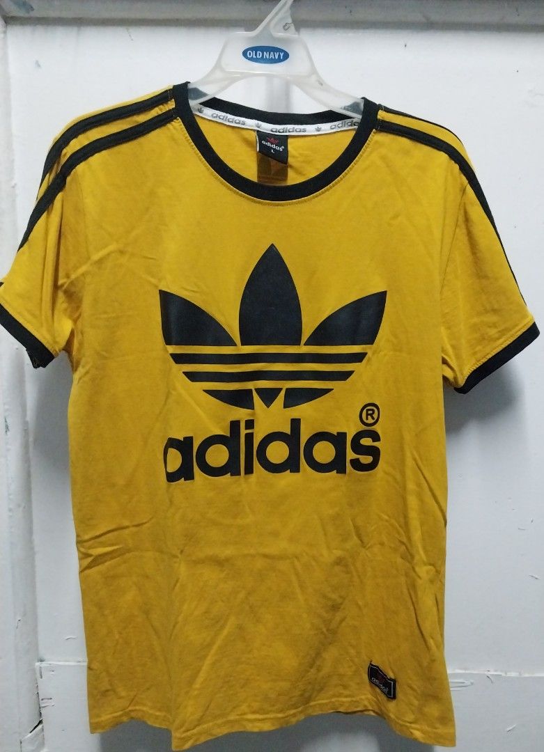 Adidas Unisex Shirt (Category: Tshirts & Polo Shirts ) located in Quezon City. Submitted by Ashleigh09 (Listing ID 1223715747, Image 1). Description: Bought from Greenhills Length 28inches Width 20 inches In very good condition RFS: Hindi ko na po nagagamit, nakatago lang.