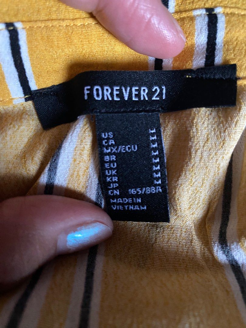 Preloved Forever21 Dress (Category: Dresses) located in Quezon City. Submitted by patsutsay21 (Listing ID 1223648650, Image 2). Description: Preloved Forever21 Dress Bought in 2020 but never worn Missing one button.