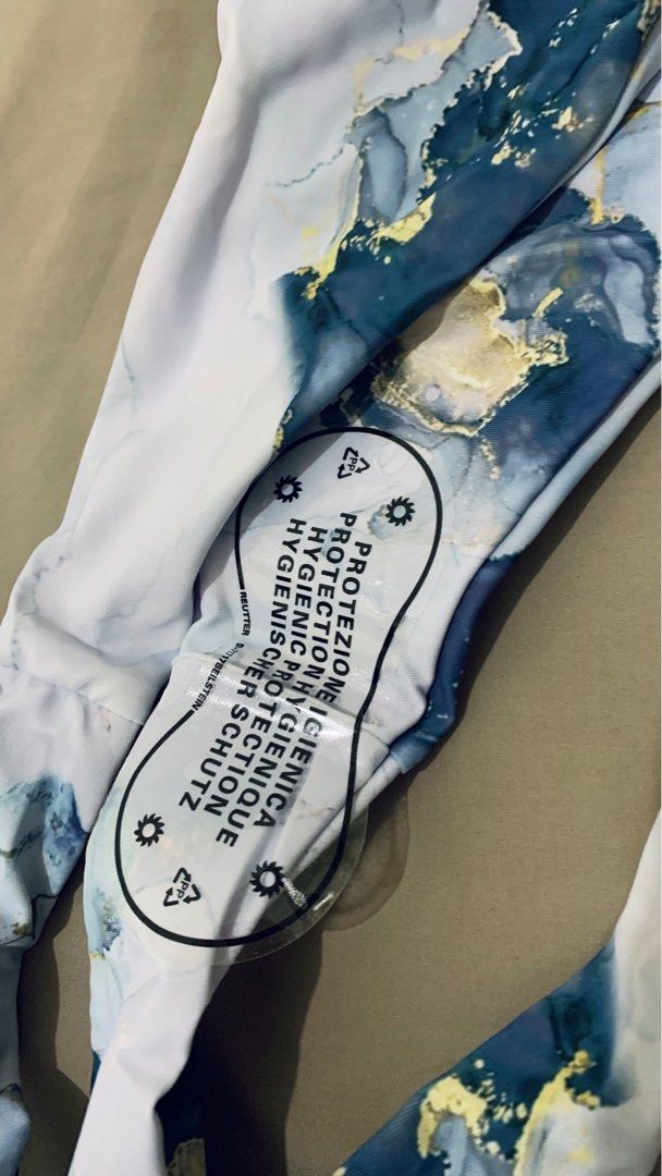 Unused 3 Piece Blue Marble Pattern Bikini (Category: Undergarments & Loungewear) located in Makati City. Submitted by cath.declutters (Listing ID 1223731065, Image 2). Description: Still comes in original package Medium Size suitable for 45-50 KG With sheer skirt cover up RFS: Bought something else .