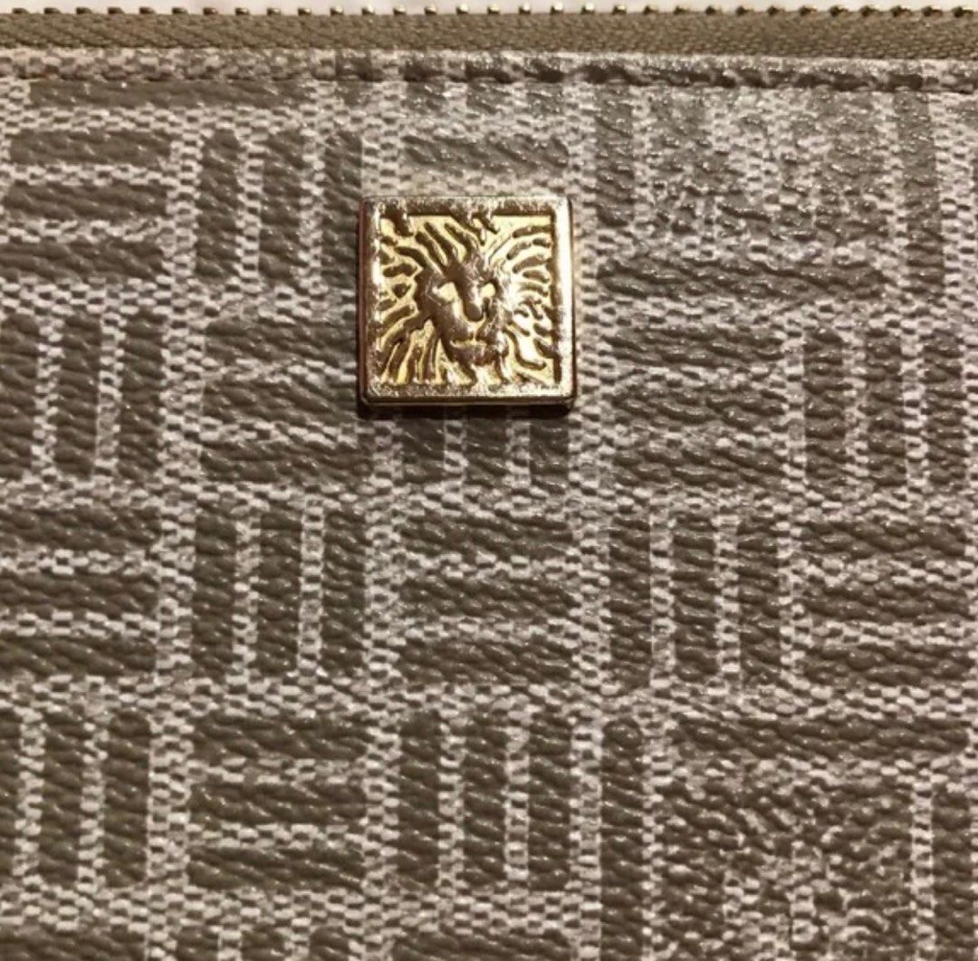Anne Klein slim zip around wallet (Category: Wallets & Card holders) located in Muntinlupa City. Submitted by declutteringmnl (Listing ID 1223842744, Image 3). Description: With signature logo plate Color looks tan beige could be called lilac Gold tone hardware Zip around wallet Measures approx 8x4x1” 12 credit card slots , 1 zip pocket An expandable open pouch Preowned Missing the detachable wristlet strap with flaws on inside as shown in last p