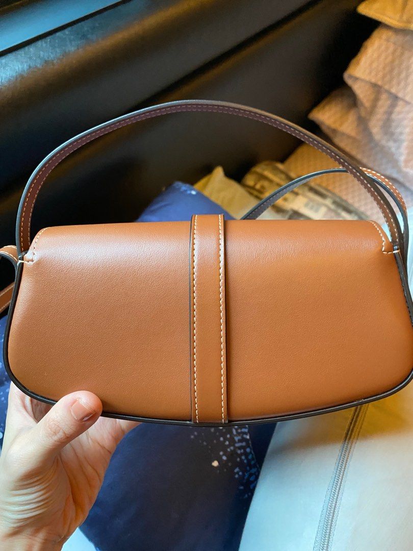 Meet Celine's Versatile Tabou Clutch On Strap Bag - BAGAHOLICBOY