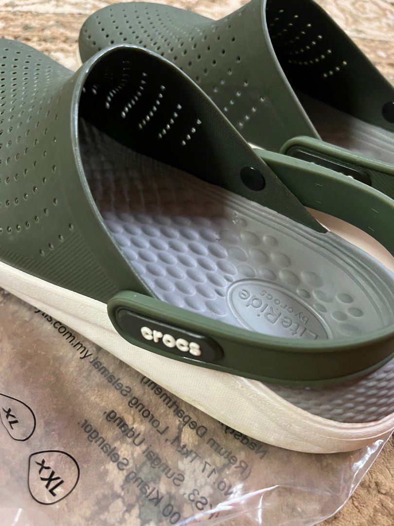 grey and green crocs