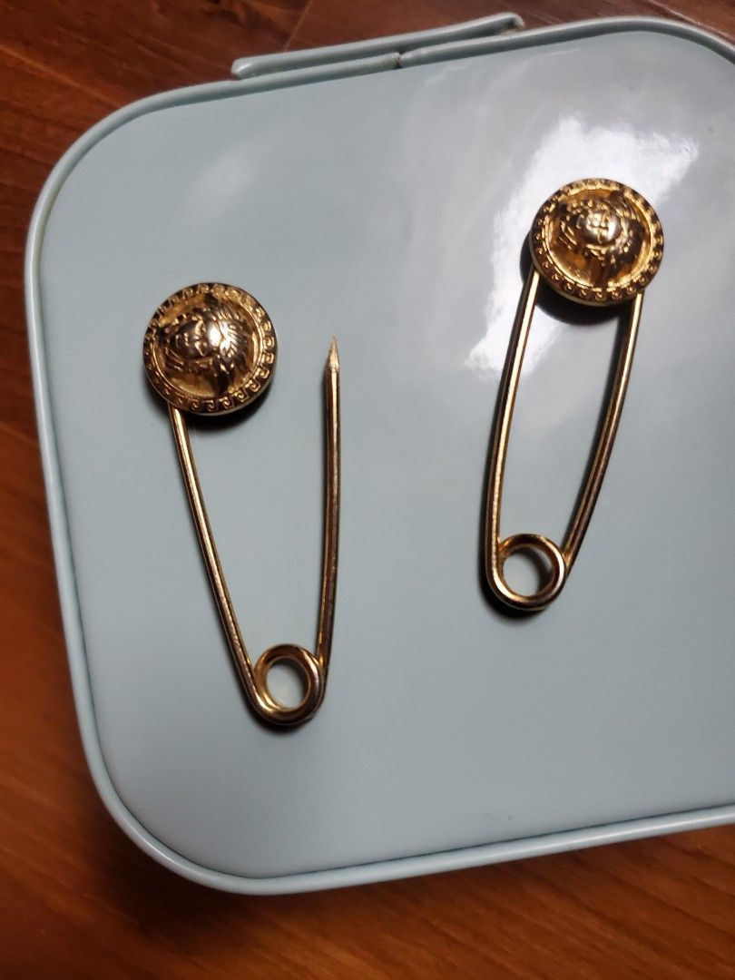 Versace brooch store