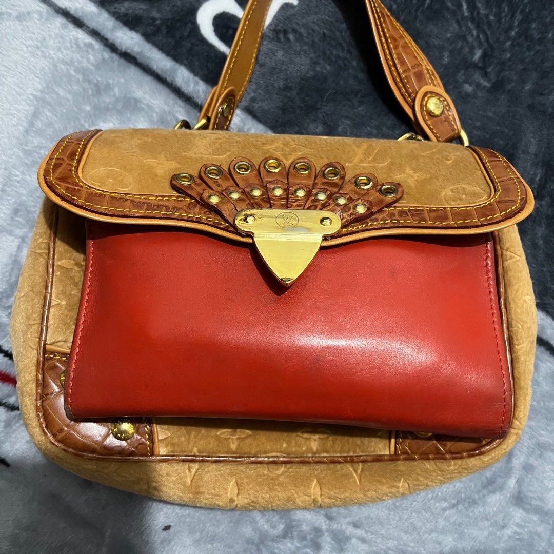 Louis Vuitton (Category: Luxury Bags & Wallets) located in Makati City. Submitted by fabiloushop (Listing ID 1223834107, Image 3). Description: Unique style Hand bag Mini size - can fit wallet and phone Gamoza fabric with leather Complete rivets No code .