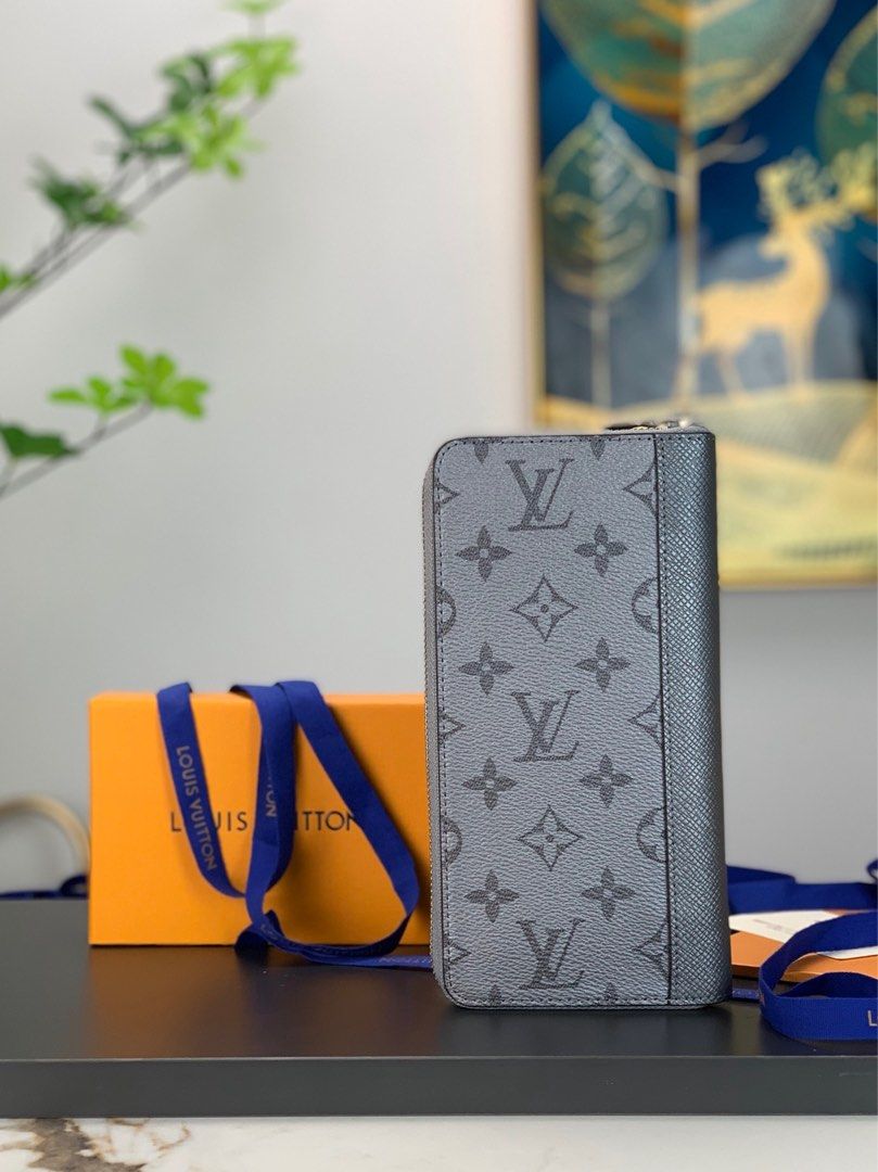 Louis Vuitton Ebene Vertical Zippy Wallet - A World Of Goods For