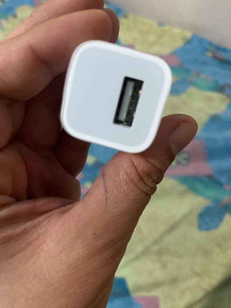 Original Iphone 5w adaptor (Category: Chargers & Cables) located in Pasig City. Submitted by fiercemoon_f4c53e (Listing ID 1223784666, Image 2). Description: Preloved item good as new no issues in good condition .