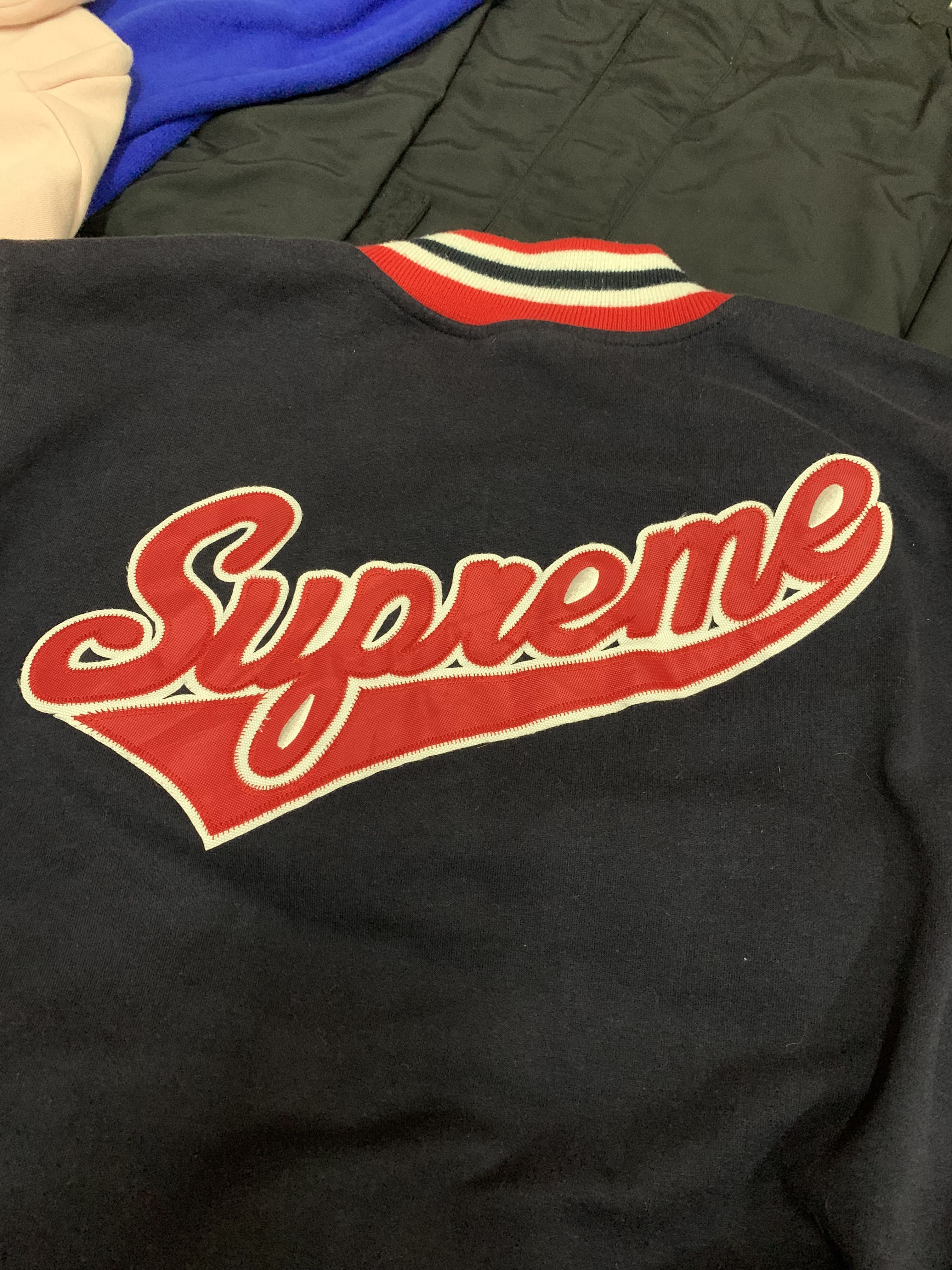 Supreme varsity, Men's Fashion, Tops & Sets, Tshirts & Polo Shirts