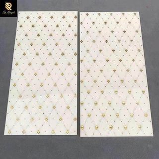 white floral tiles with gold floral design