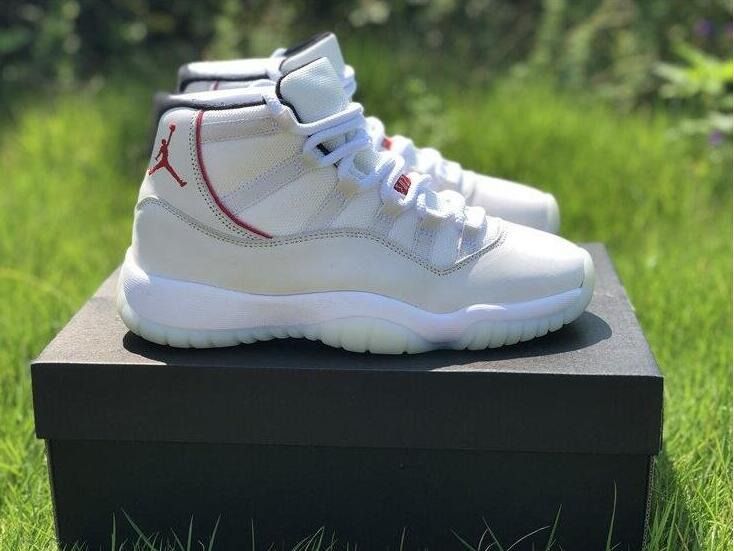 Jordan 11 retro platinum tint men's shoe discount