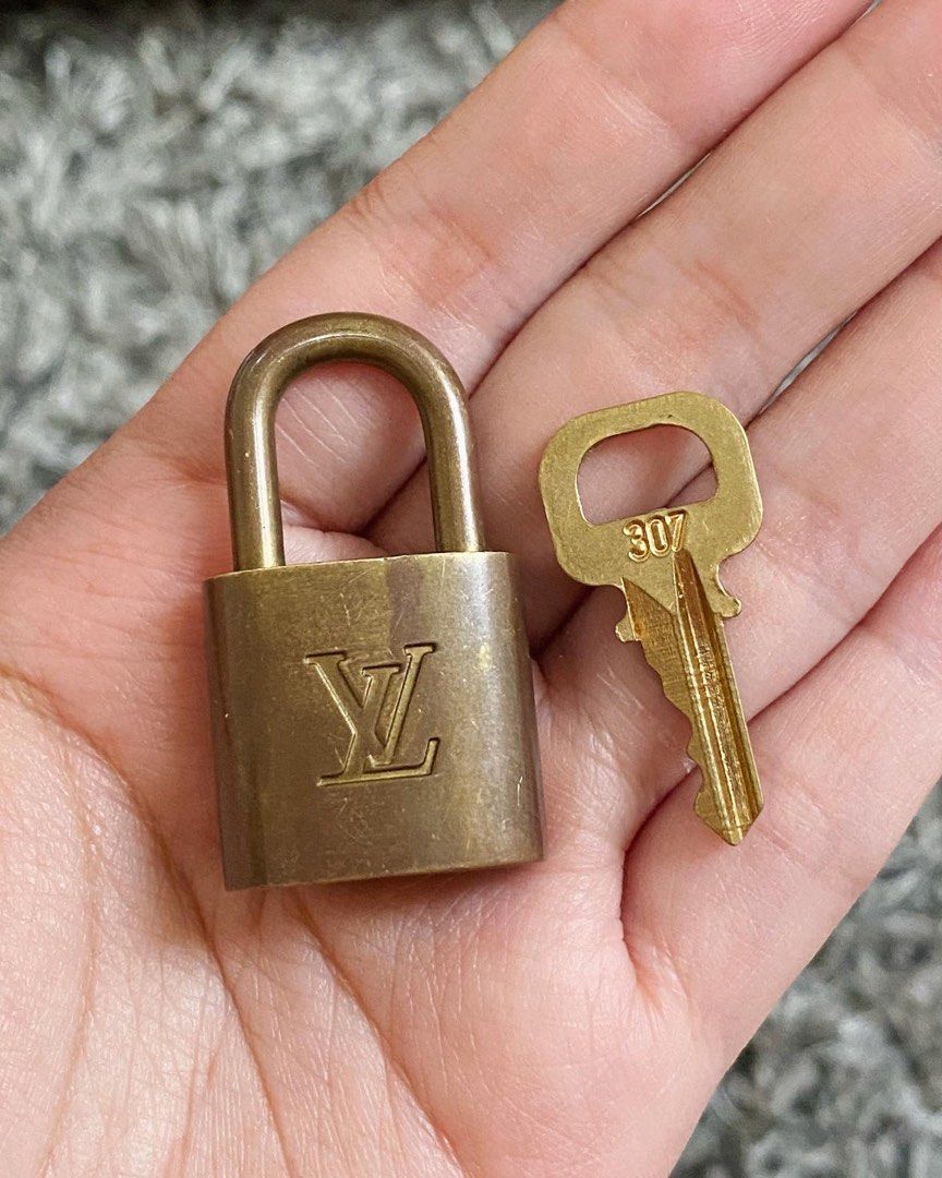 Authentic Louis Vuitton Lock and Key, Luxury, Bags & Wallets on