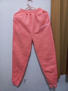 Celana training warna orange muda