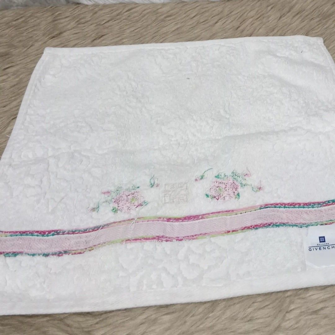 Givenchy White Face Towel (Category: Face Care) located in Caloocan City. Submitted by sassypurchased (Listing ID 1218644786, Image 3). Description: Givenchy White Face Towel 299 Good condition From Japan Preloved Shop NOT UKAY SOURCE Measurements: H-12.5 L-12.5 inches approx DETAILS ARE POSTED IN THE PIC ♥️Sold as is. What you see is what you get. Price reflects condition ♥️Please manage your expectations because it is a pre-loved item and will 