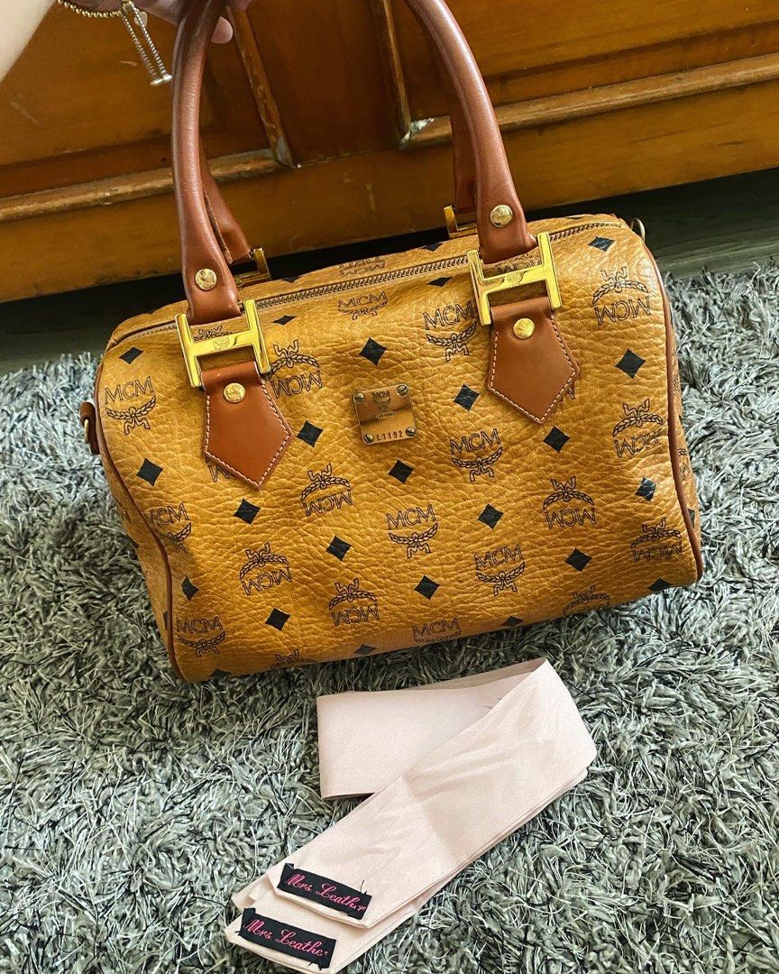 MCM in Visetos Mini Boston (Category: Luxury Bags & Wallets) located in Manila. Submitted by msbelleph (Listing ID 1218668744, Image 2). Description: MCM in Visetos Mini Boston Super nice in actual❤️ 2 compartments inside Comes with free twilly😘 Low ballers will not be entertained. Please be reasonable when haggling :) ▪️Meet up at Sun Mall Welcome Rotonda and SM San Lazaro only ▪️Grab Express or Lalamove ▪️Ships nationwide via LBC- COD/COP acce