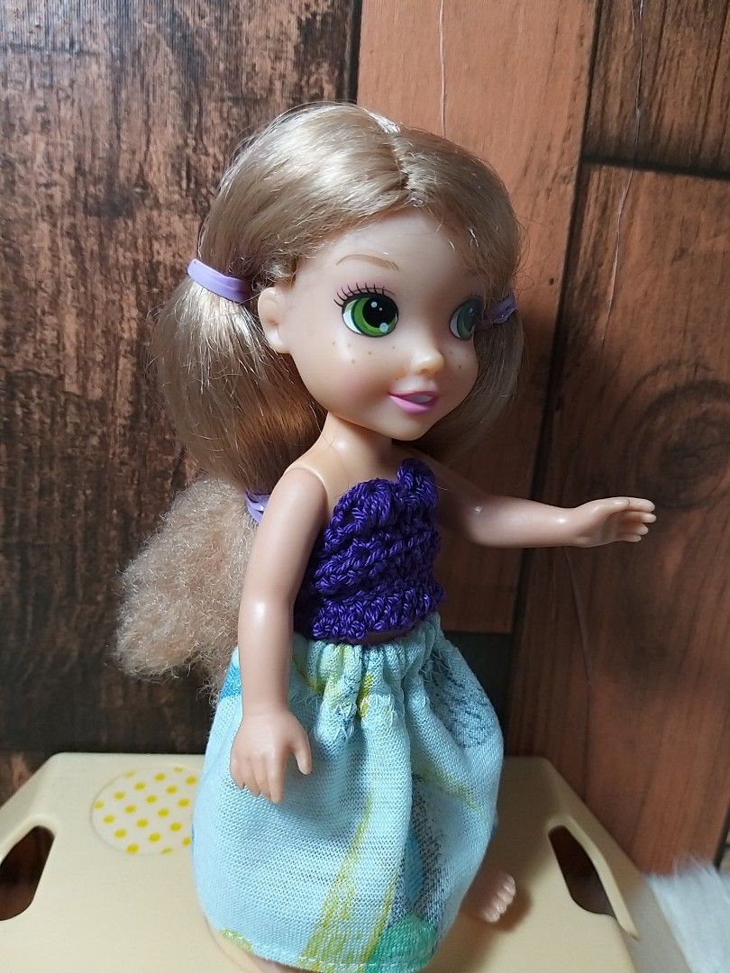 Mini Disney Animator doll Rapunzel (Category: Figurines & Statues) located in Cavite. Submitted by Mavee (Listing ID 1218644301, Image 2). Description: Original Disney mini Animator doll Rapunzel, Only flaws: Frizzy ends of hair, and some stains at the back. Joints are all tight.