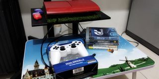 Play Station 3 Super Slim 500GB with CDs