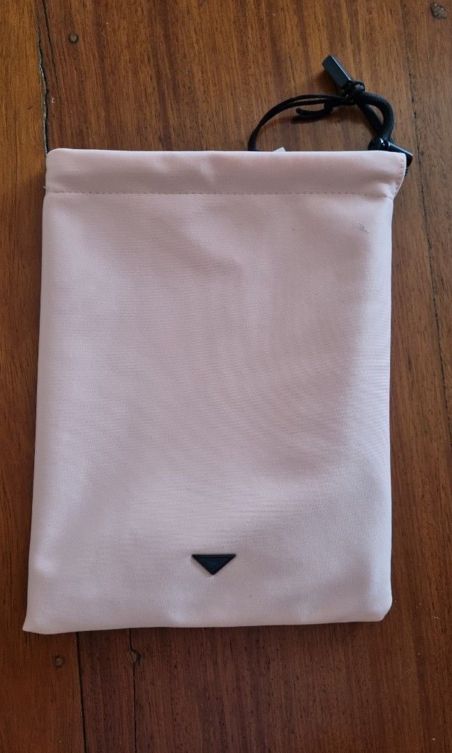 Prada Original Reversible Cotton Pouch (Category: Purses & Pouches) located in Makati City. Submitted by AnnaK (Listing ID 1218578504, Image 2). Description: PRADA Beauty pouch for make-up and other knick knacks. Reversible baby pink/black. Size - 6.5" W 8.5" L. It comes with a reusable black bag w label. RFS : I don't need it after getting it in the outlet..