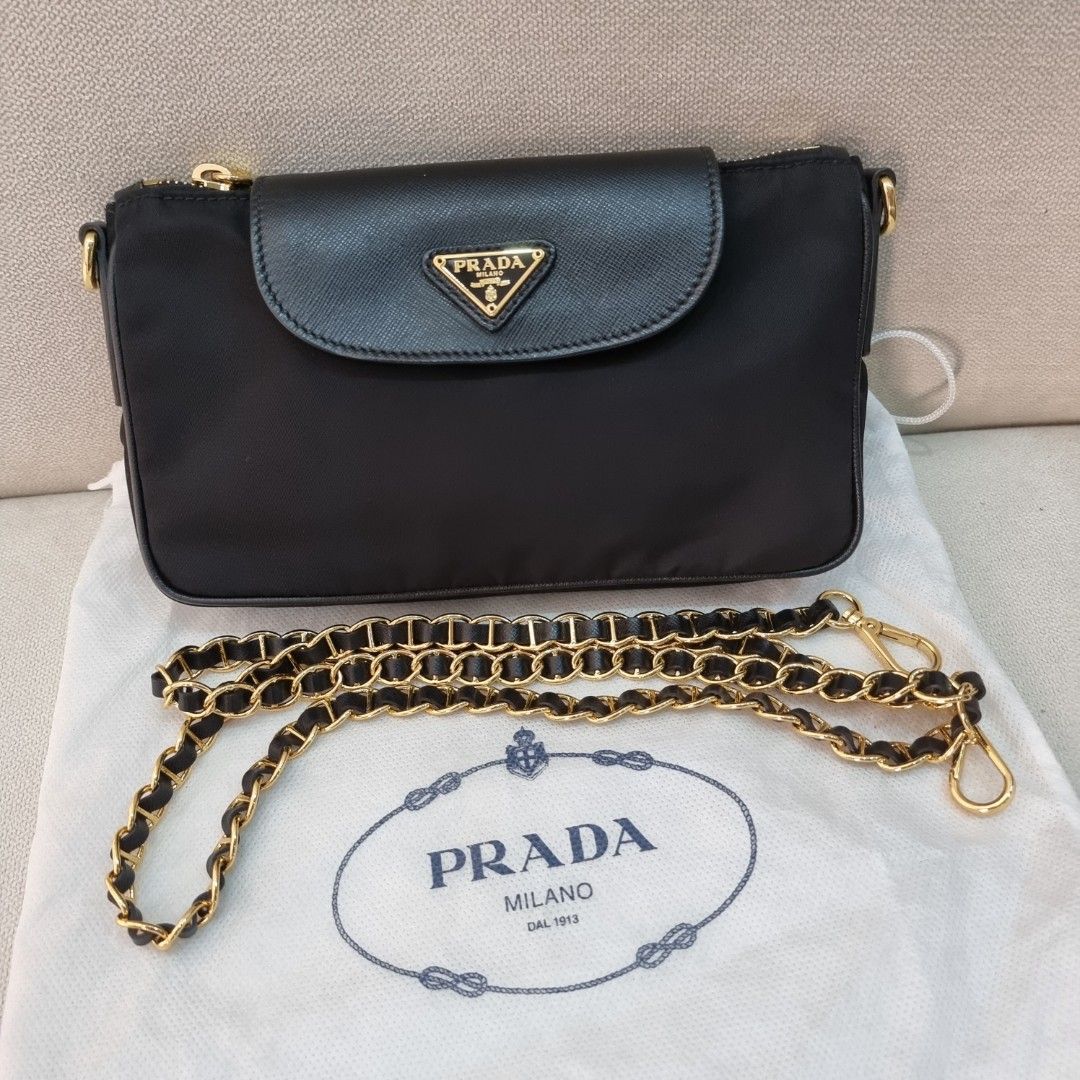 Prada wallet on chain, Luxury, Bags & Wallets on Carousell