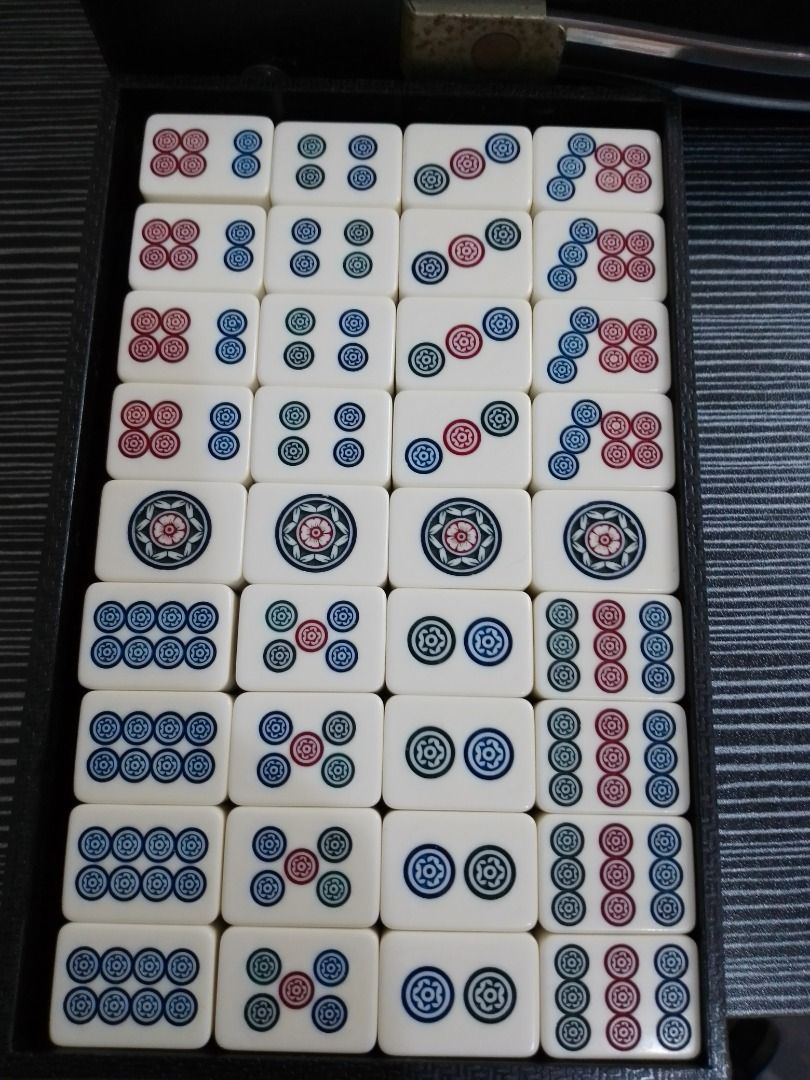 Vintage Mahjong Set (Category: Board Games & Puzzles) located in Paranaque City. Submitted by donjuan_thegreat (Listing ID 1218741175, Image 3). Description: Item in very good vintage condition 144 Tiles Dimensions: Case: L 29.5 cm, H 19 cm, W 4.5 cm Tile: W 1.5 cm, H 2.5 cm, L 1.7 cm For pick-up at UPS 5 Paranaque or can ship at buyer's expense .