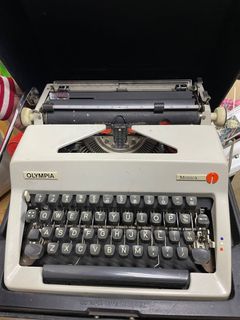 Antique Typewriter Olympia Monica476479566077634560