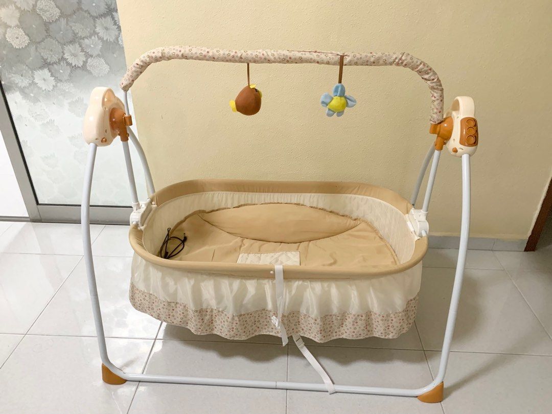 Electric baby bed hotsell