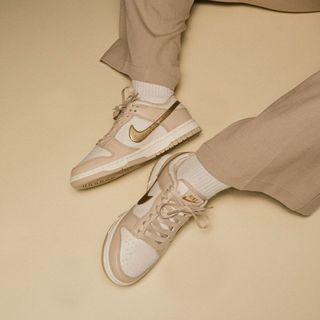 BNIB Nike Dunk Low WMNS “Gold Swoosh”