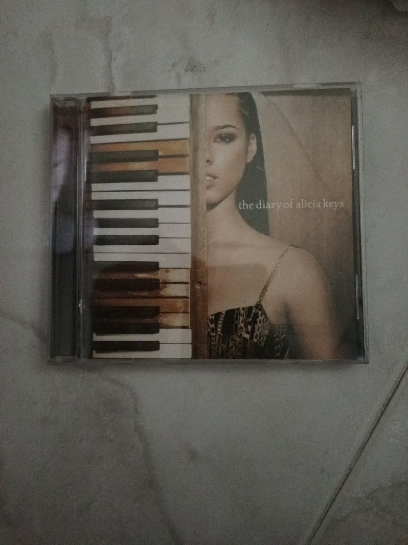 Assorted CDs (Category: CDs & DVDs) located in Singapore. Submitted by declutterranger (Listing ID 1218046695, Image 1). Description: original CDs, Diary of Alicia Keys (Alicia Key).