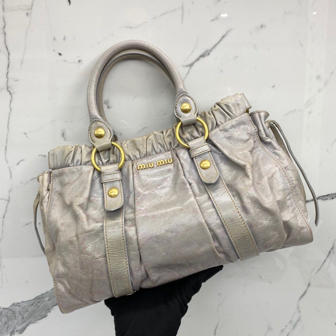 Miu Miu Sling Bag , Women's Fashion, Bags & Wallets, Shoulder Bags on  Carousell