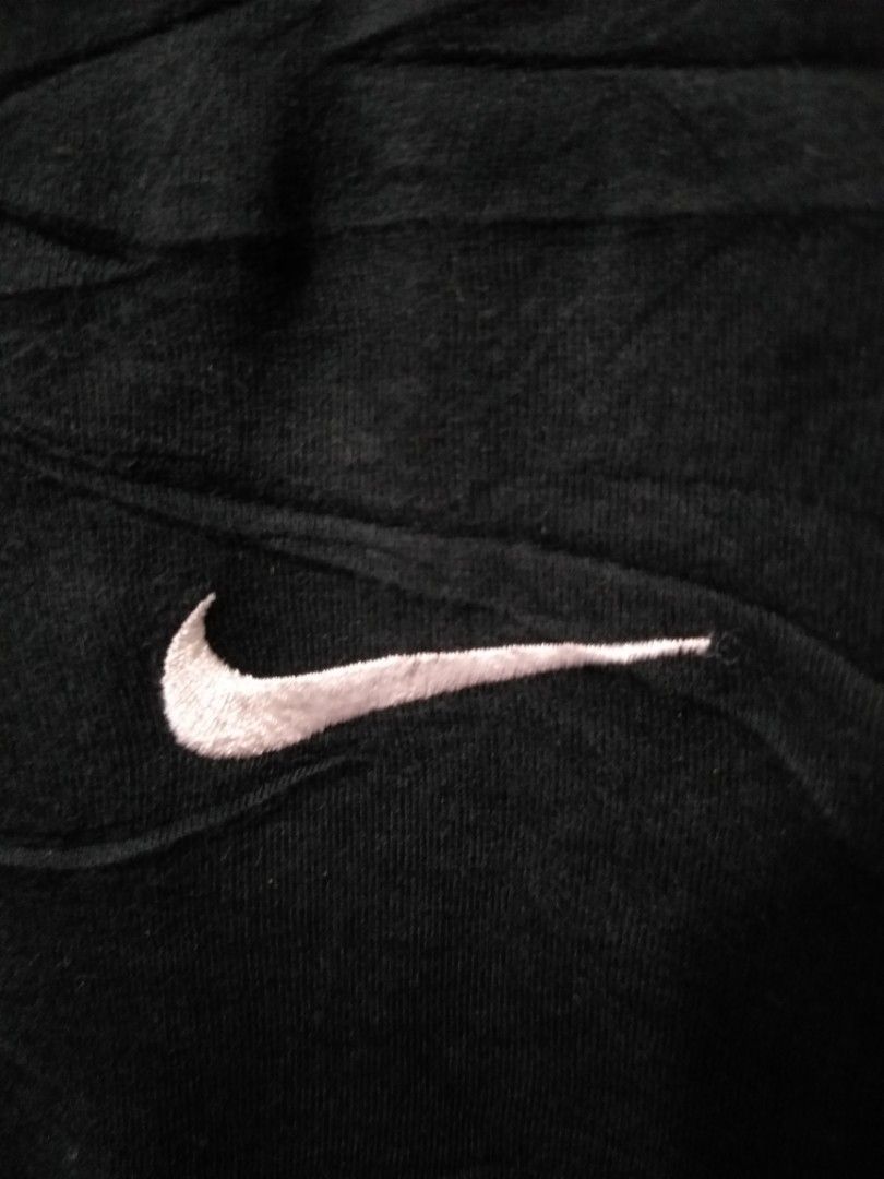 backward nike swoosh