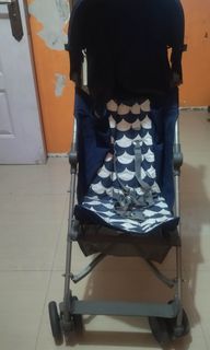 Stroller with baby clothes