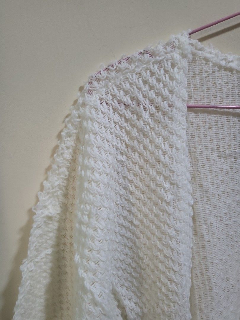 White cardigan (Category: Coats, Jackets and Outerwear) located in Manila. Submitted by kth18 (Listing ID 1218855740, Image 2). Description: ♡ good condition, perfect for beach outfit ♡ M-L ♡ negotiable. DM me 🙂 ♡ ggx / shopee co.