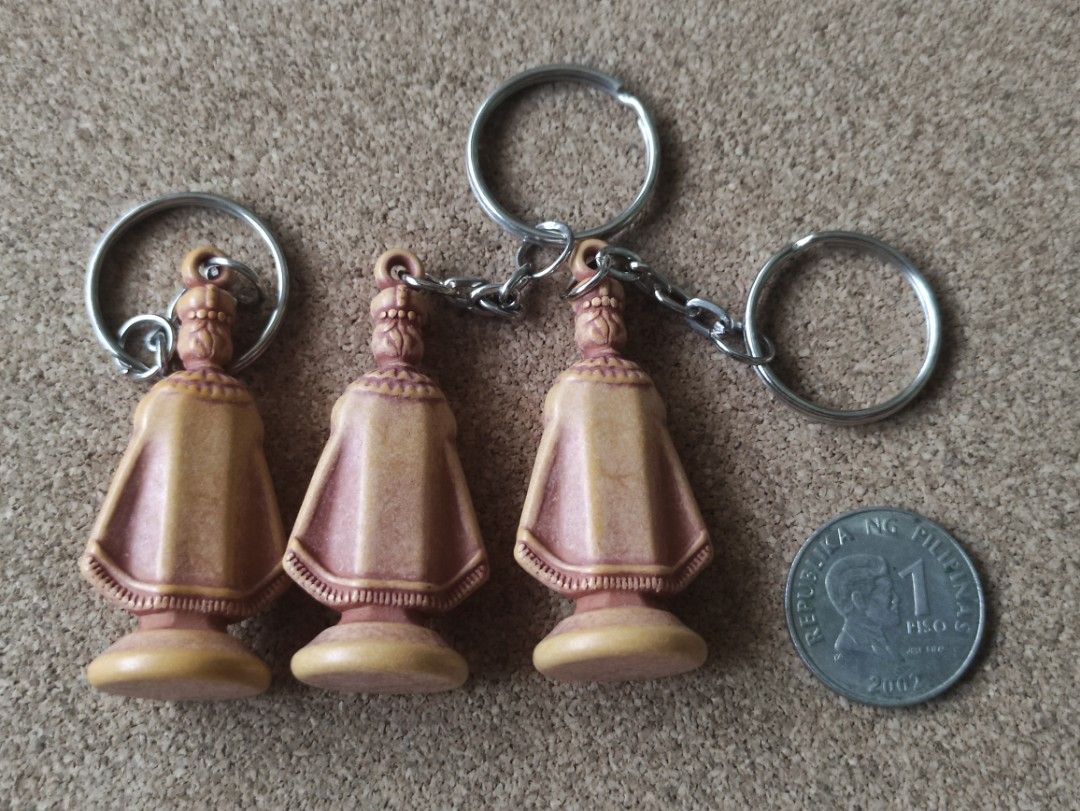 3 pcs Sto. Niño Keychains (Category: Vintage Collectibles) located in Lipa City. Submitted by mark_collections (Listing ID 1219022532, Image 2). Description: 3 pcs Sto. Niño Keychains - 1 piso coin not included Mode of Payment: Gcash.