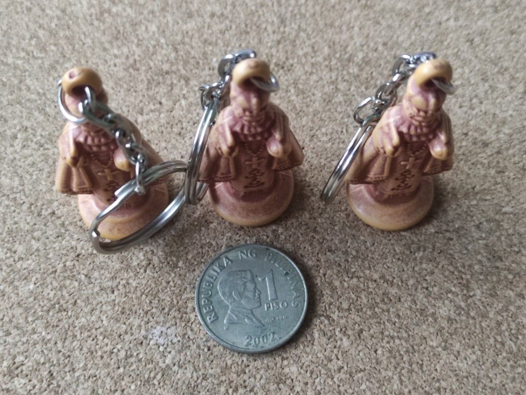 3 pcs Sto. Niño Keychains (Category: Vintage Collectibles) located in Lipa City. Submitted by mark_collections (Listing ID 1219022532, Image 3). Description: 3 pcs Sto. Niño Keychains - 1 piso coin not included Mode of Payment: Gcash.