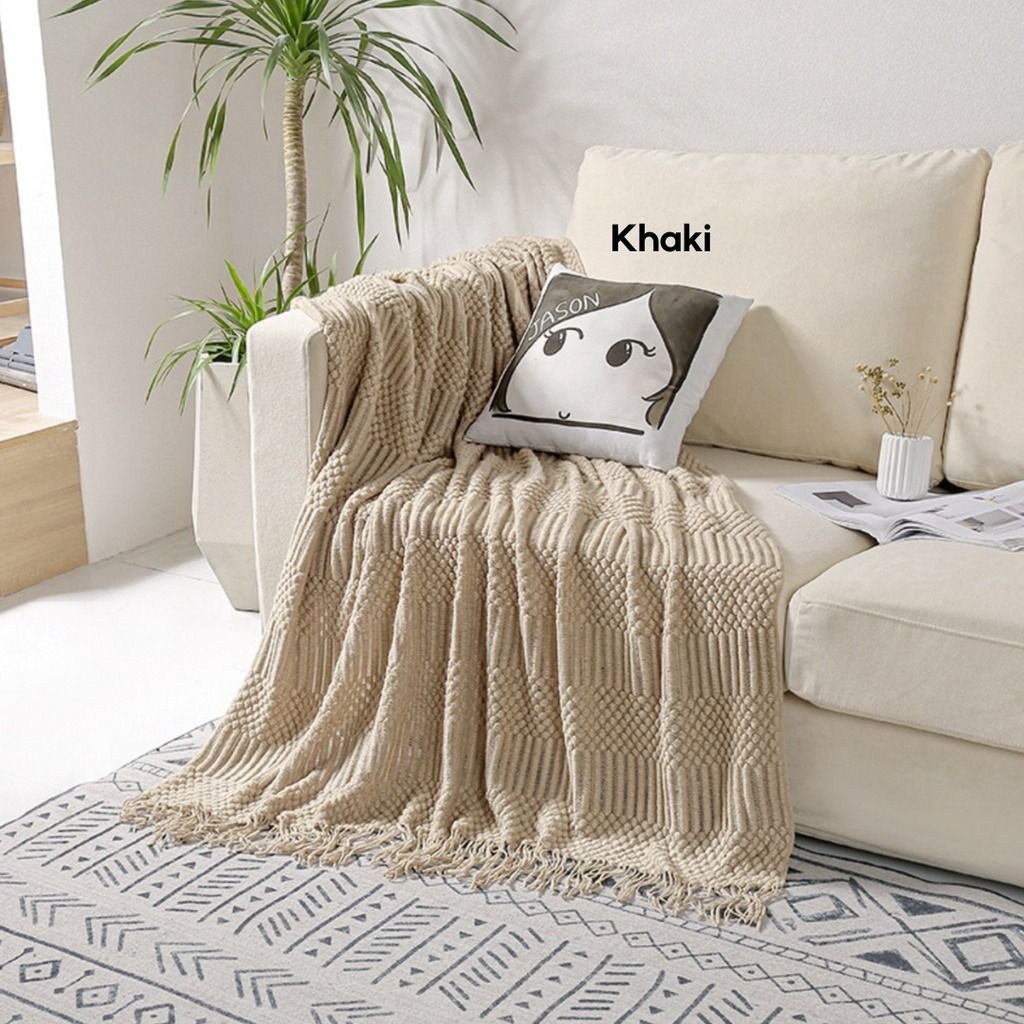 Knitted tassel throw top