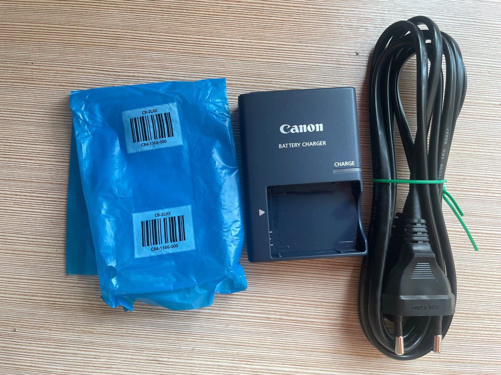 Cannon battery Charger, Photography, Cameras on Carousell