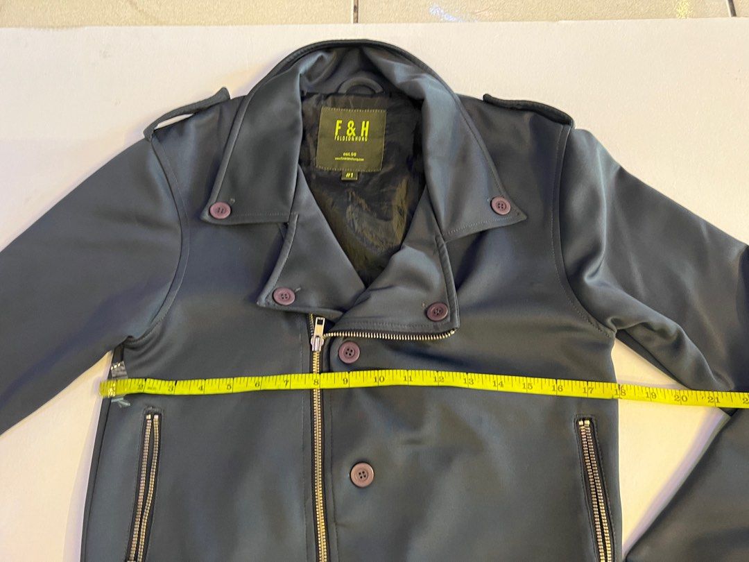 Motorcycle Jacket (Category: Coats, Jackets and Outerwear) located in Quezon City. Submitted by b.caster (Listing ID 1218984011, Image 2). Description: Folded and hung brand original price is 2,800 missing 1 button shown in the photo very good condition neoprene fabric / lining nylon material.