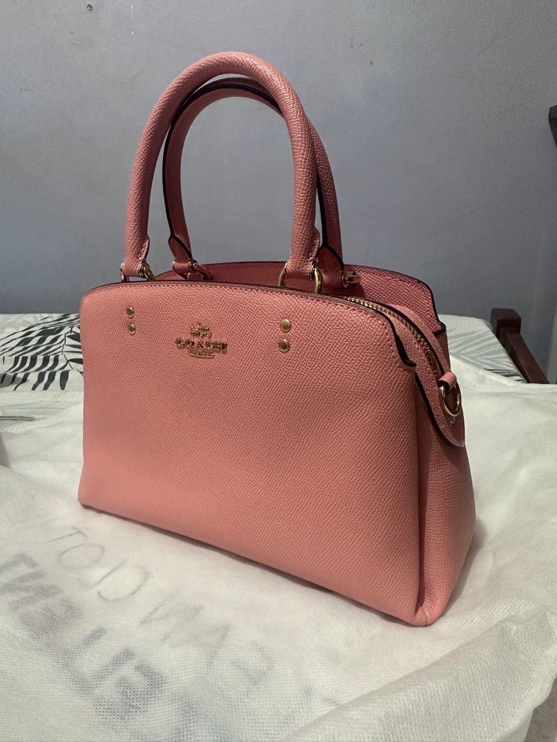 Original Coach Bag/Brand New (Category: Cross-body Bags) located in Cebu City. Submitted by ojaypreloved (Listing ID 1219136953, Image 1). Description: Original. Lillie Caryall Mini Bought this is Vancouver outlet last November. Used once, super brand new, like no signs of usage.