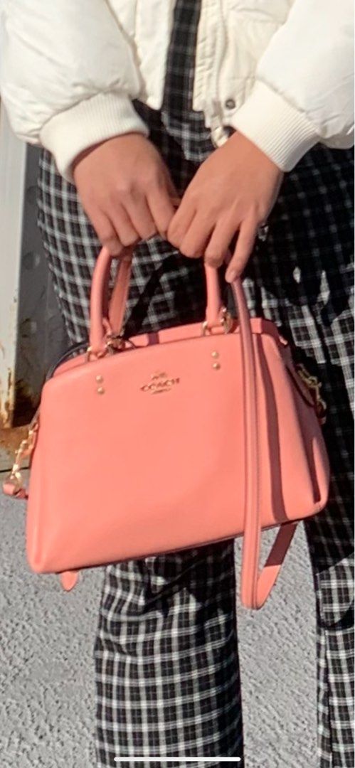 Original Coach Bag/Brand New (Category: Cross-body Bags) located in Cebu City. Submitted by ojaypreloved (Listing ID 1219136953, Image 3). Description: Original. Lillie Caryall Mini Bought this is Vancouver outlet last November. Used once, super brand new, like no signs of usage.