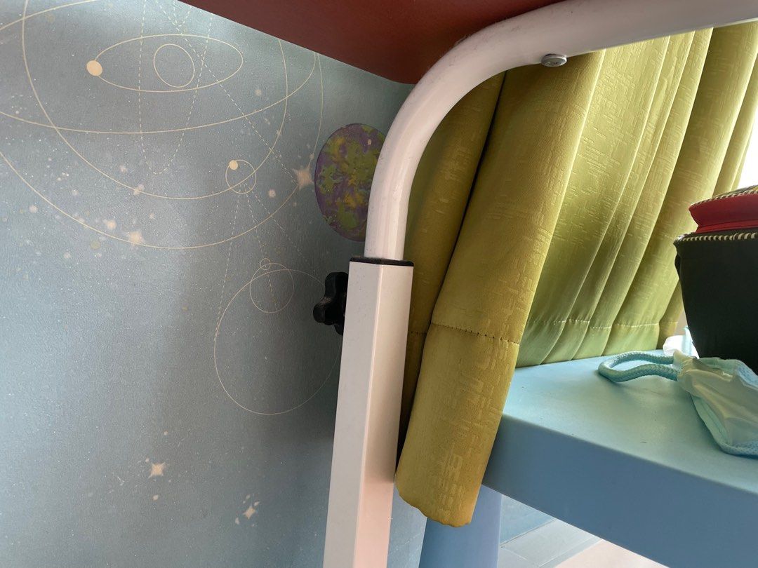Small Study/Work table - height adjustable (Category: Tables & Sets) located in Singapore. Submitted by wminimalist (Listing ID 1219157759, Image 2). Description: Small work/study table for sale. As good as new. New stains or discolouration. Height can be manually adjusted. .
