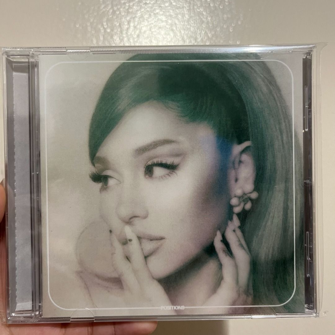 Ariana Grande - Positions CD (UK Edition) (Category: CDs & DVDs) located in Baguio. Submitted by howawell (Listing ID 1219287340, Image 1). Description: Positions CD (UK Edition) - Unsealed but never played - Contents checked and complete - Stored in a resealable CD sleeve - Message me for inquiries or additional photos Mode of Payment: GCash Mode of Delivery: J&T Express Price: ₱400 + local shipping fee.