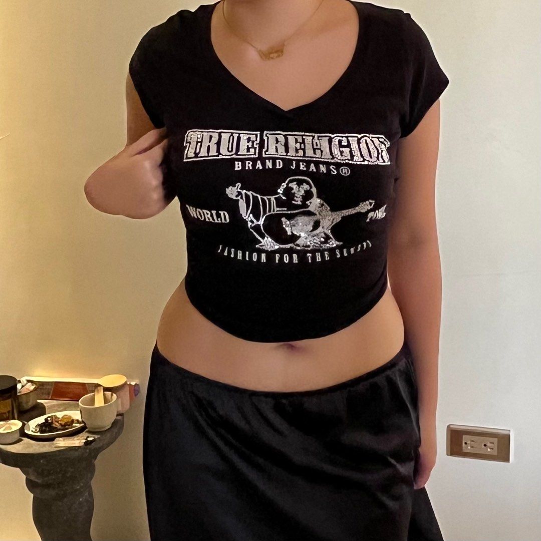 Authentic True Religion V-neck Top (Category: Shirts) located in Calamba. Submitted by fromynes (Listing ID 1219197362, Image 2). Description: 💌 @fromynes on ig thrifted, expect missing rhinestones wash tag still intact very comfy to wear small-medium shopee checkout available!.